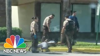 Video Shows Florida Police Officer Kick Handcuffed Teen | NBC News