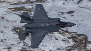 USAF F35A Flying Nice and Low Through a Beautiful Snow Scenery.