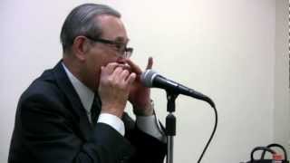 ハ-モニカ伝道師　（トンボ楽器会長）真野泰治さんの語りと実演