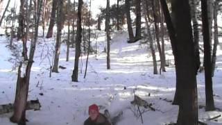 Snow Sled Wipeout. Snow Sledding on a remote hill in Belgrade Maine.