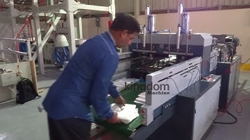 Máy cắt, dán túi và dập quai tự động