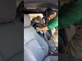 CoverExpert custom camouflage seat cover for Toyota Tacoma installing