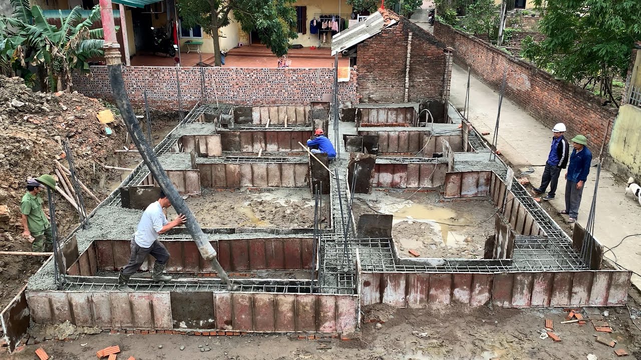 Constructing Solid House Foundations With Modern Machinery And Working ...