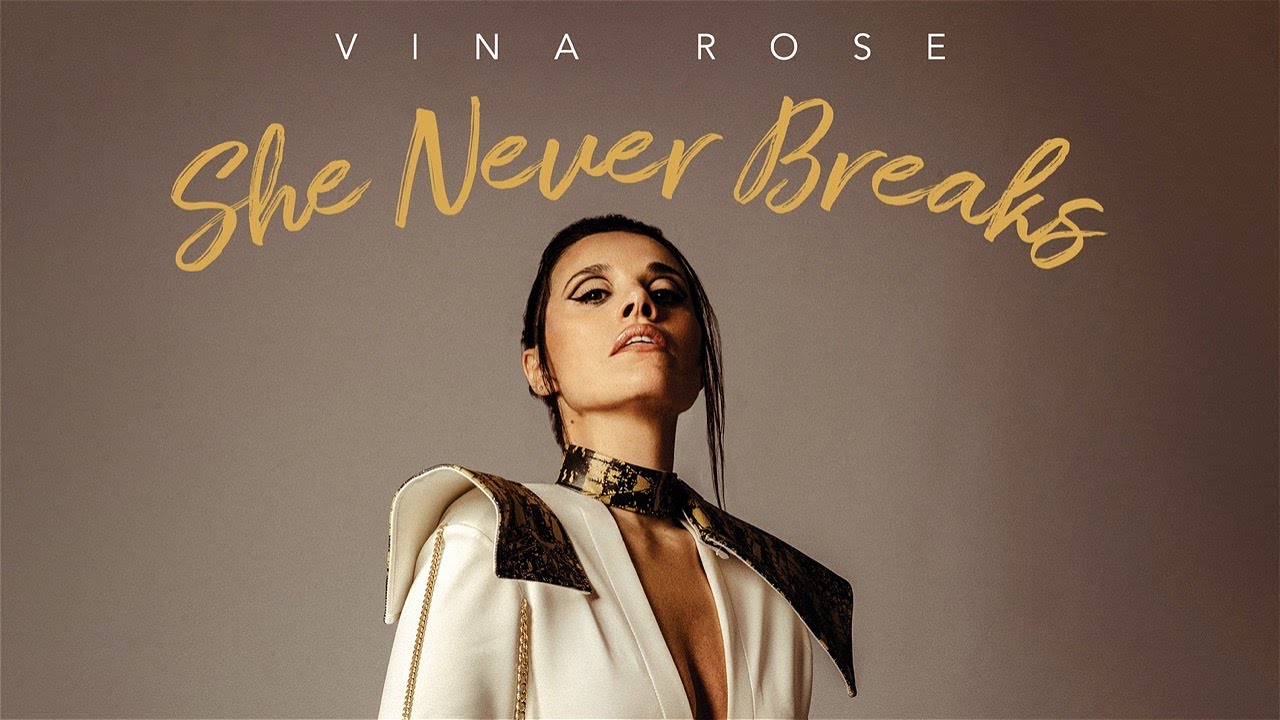 Watch Vina Rose - She Never Breaks (Official Lyric Video) on YouTube Watch Vina Rose - She Never Breaks (Official Lyric Video) on YouTube
