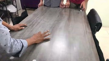 Elastic collision between two identical bodies in two dimension