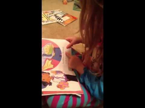 Kenlie reads Strawberry Shortcake Berry Thankful