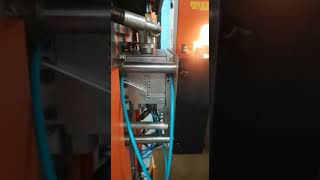 Two Cavity High Speed Stretch Bottle Blowing Machine with Automatic Bottle Ejection Machine.