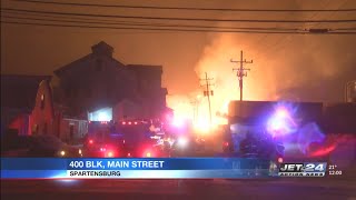 Several fire departments brave freezing temperatures, strong winds to fight overnight lumber fire