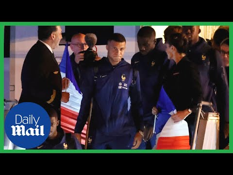 Emotional mbappe and france world cup team return after defeat to argentina in qatar