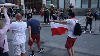 Football fans crazy Wiggle dance with Snoop Dogg in the center of Moscow