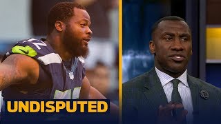 Marshawn Lynch, Michael Bennett sit on bench for national anthem - Shannon responds | UNDISPUTED