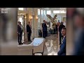 Former President Trump walks into Trump National Doral ahead of Tuesday&#39;s federal court appearance