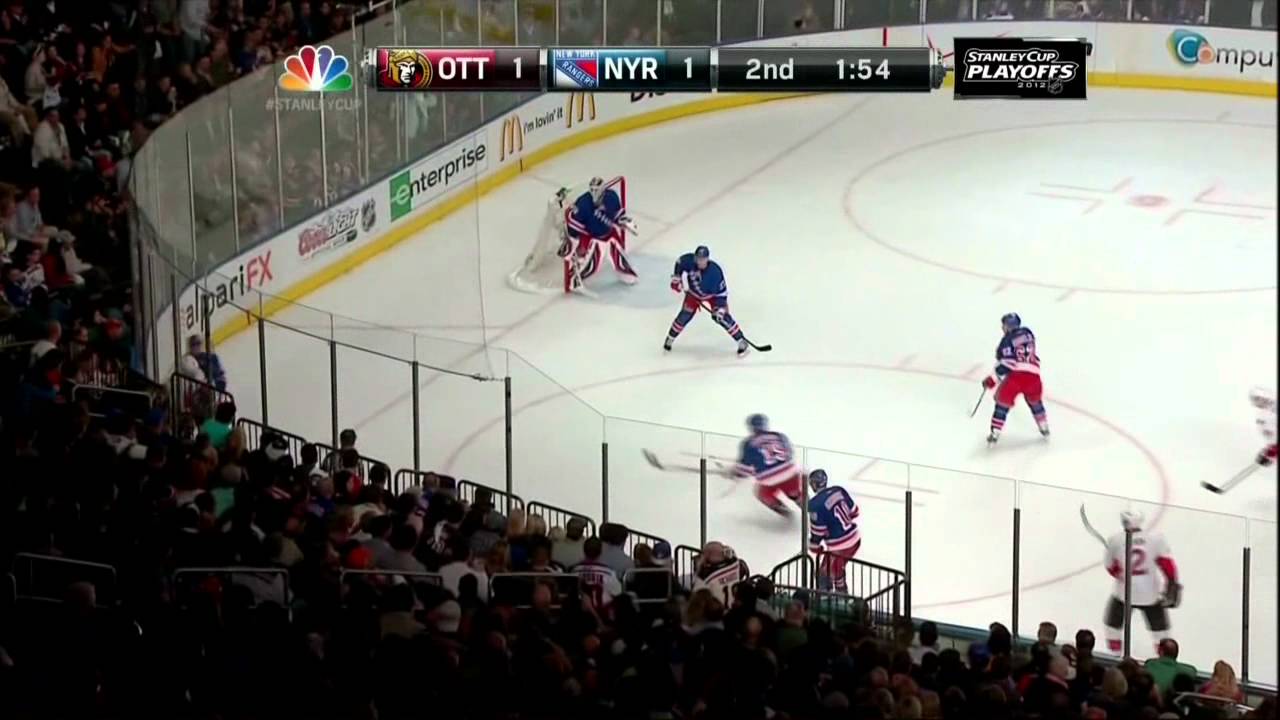 2 pucks on ice in 2nd. Ottawa Senators vs NY Rangers. 4/14/12 NHL Hockey YouTube