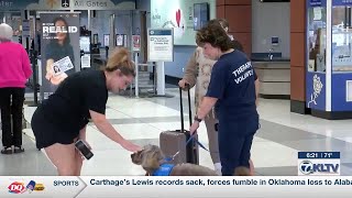 Therapet animals comfort holiday travelers at Tyler Pounds Airport