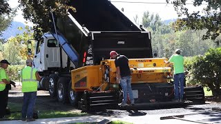 Installing an Asphalt Driveway with Clean Equipment in Great Weather.