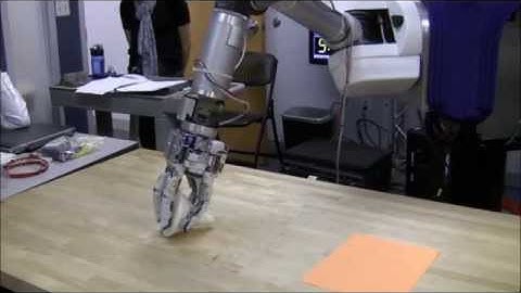 Design and Testing of a Selectively Compliant Underactuated Hand