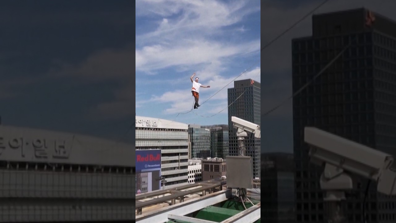 Estonian slackline champion walks between buildings