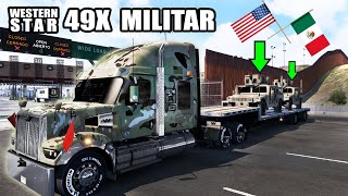 Camouflaged truck transporting US Army vehicles at the border in American Truck Simulator screenshot 3