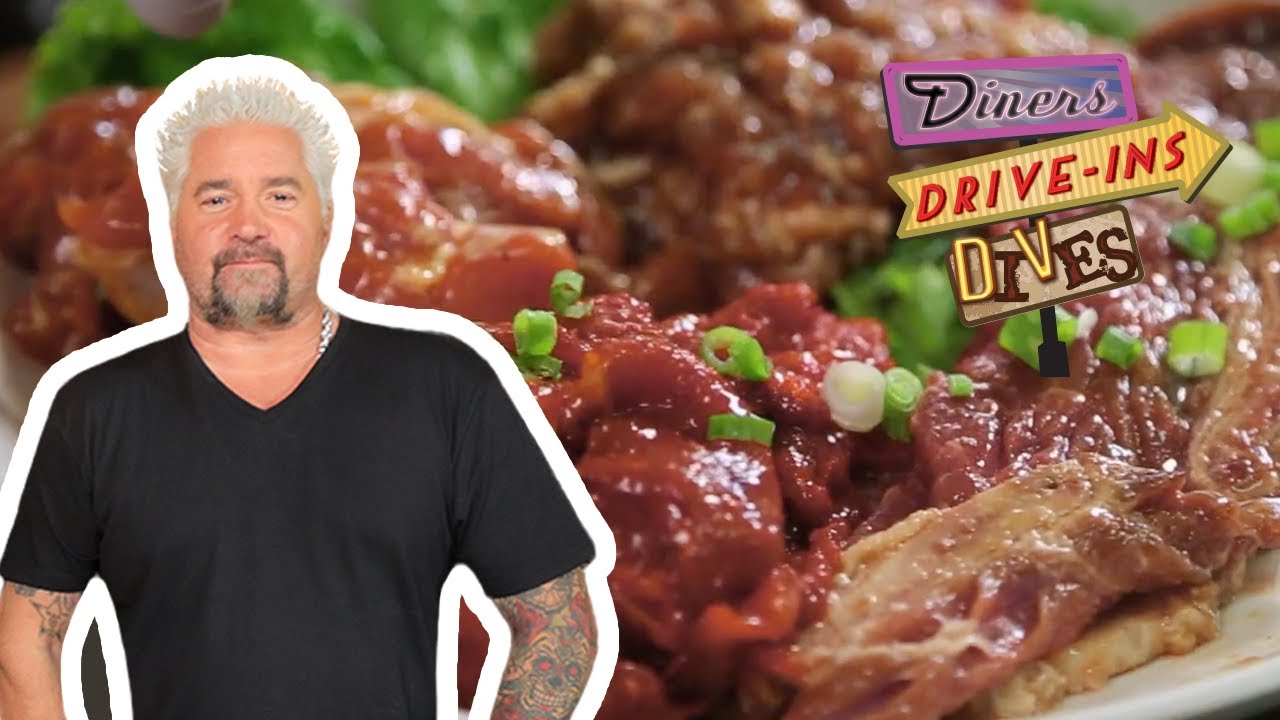 Guy Fieri Eats All-You-Can-Eat Korean BBQ | Diners, Drive-Ins and Dives | Food Network