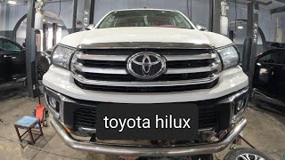 replacing lower control arm and ball joint - tie rod - sway bar bushing ... toyota hilux #hilux