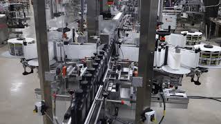 High Speed Oil Bottle Front Back Application - Zero Downtime 4 Headed Labeling System - ProLine