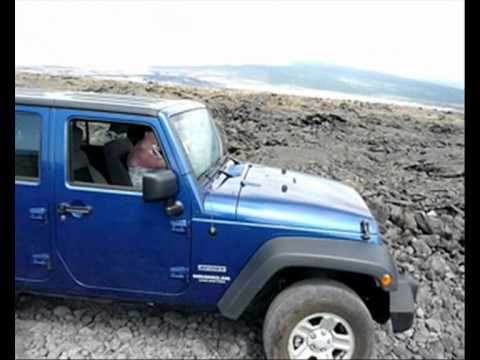 Driving Across a Hawaiian Lava Field In a Jeep Wra...