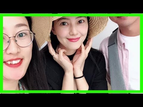 新婚夫妇度蜜月偶遇高圆圆 开心合影大赞又瘦又美