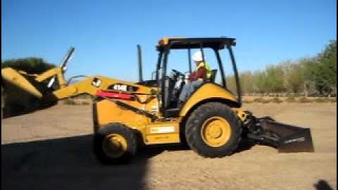 Demonstrating Start up Procedures for the CAT Skip Loader/ Grader 414E by HEO Greg Kealey