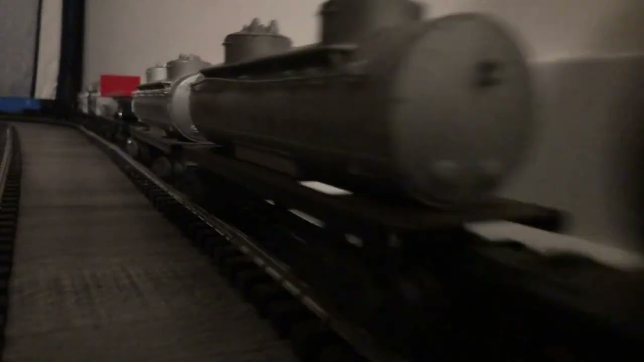 Postwar Lionel GP7 Wabash & Burlington pulling cars