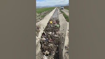 Trench Water Flow Pushing Garbage Forward !