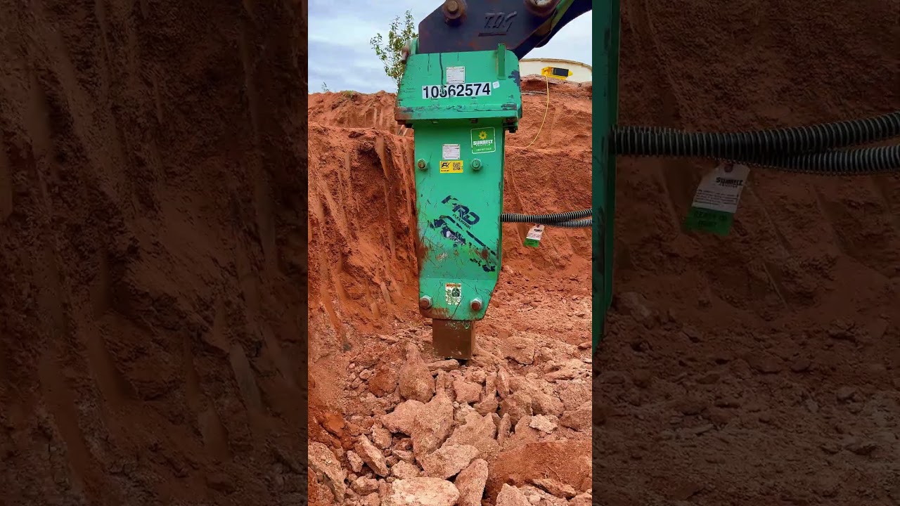 Chipping away at this MASSIVE backyard recreation pond!