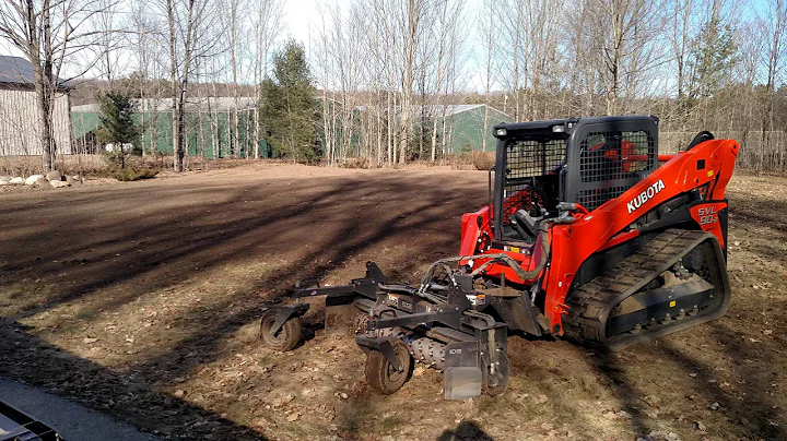 Kubota SLV90 2 Spreading Topsoil & Harley Raking A Torch Lake Property