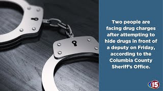 Two arrested in Columbia County after hiding drugs in front of deputy
