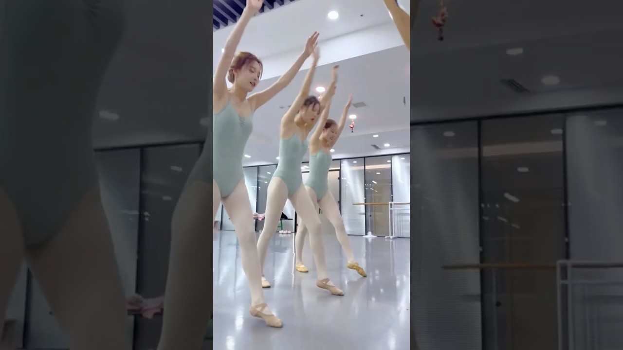 Dance students in flexibility training 