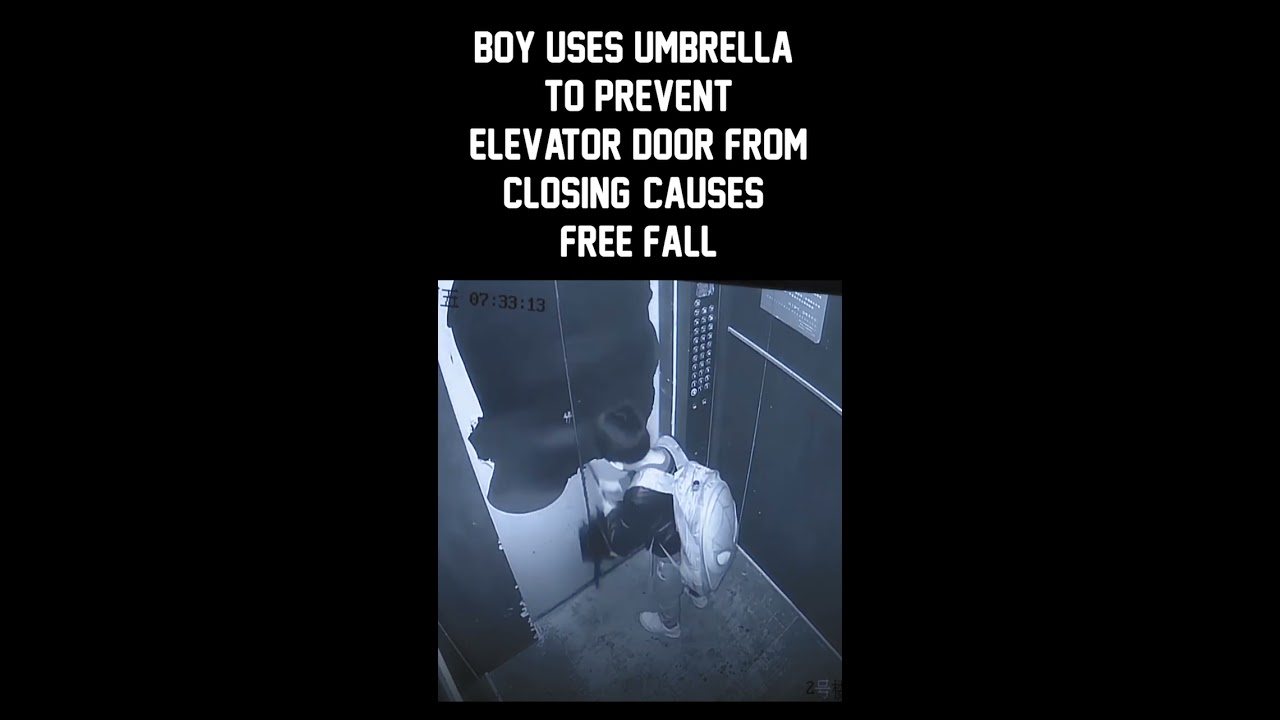 Boy Uses Umbrella To Prevent Elevator Door From Closing Causes Free Fall Shorts