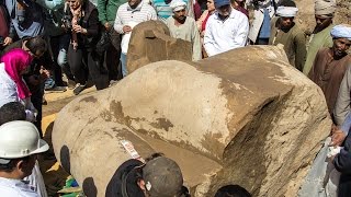 Archaeologists find ancient statue in Cairo slum