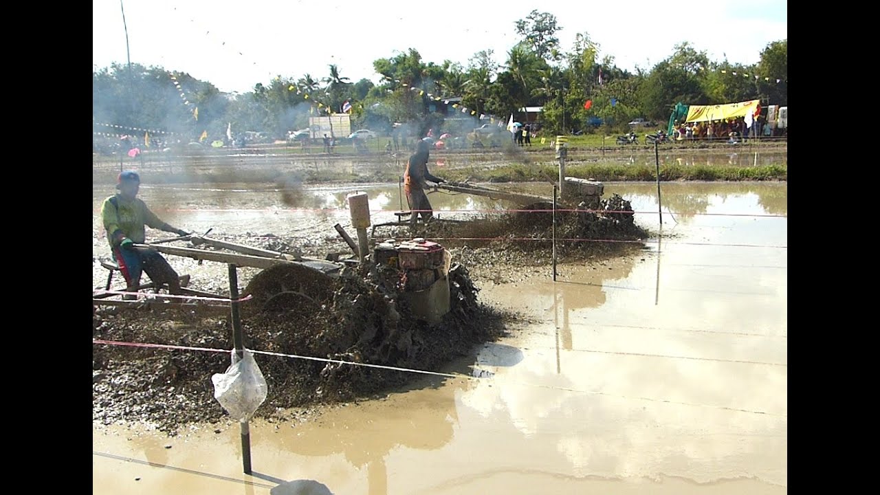farm tractors race in mud (Thailand) รถควายเหล็กชิ่ง รถไถทางเลน YouTube