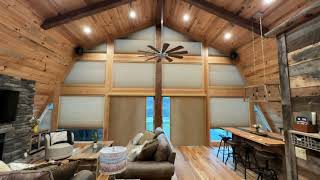 Angled Window Coverings in a Log Cabin With Trapezoid and Standard Windows