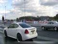 Silver Chevy Nova Vs White Grand Prix