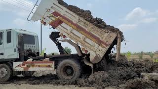 Processing Filling Up The Land Long, Bulldozer Komatsu D20P, Dump Truck Unloading