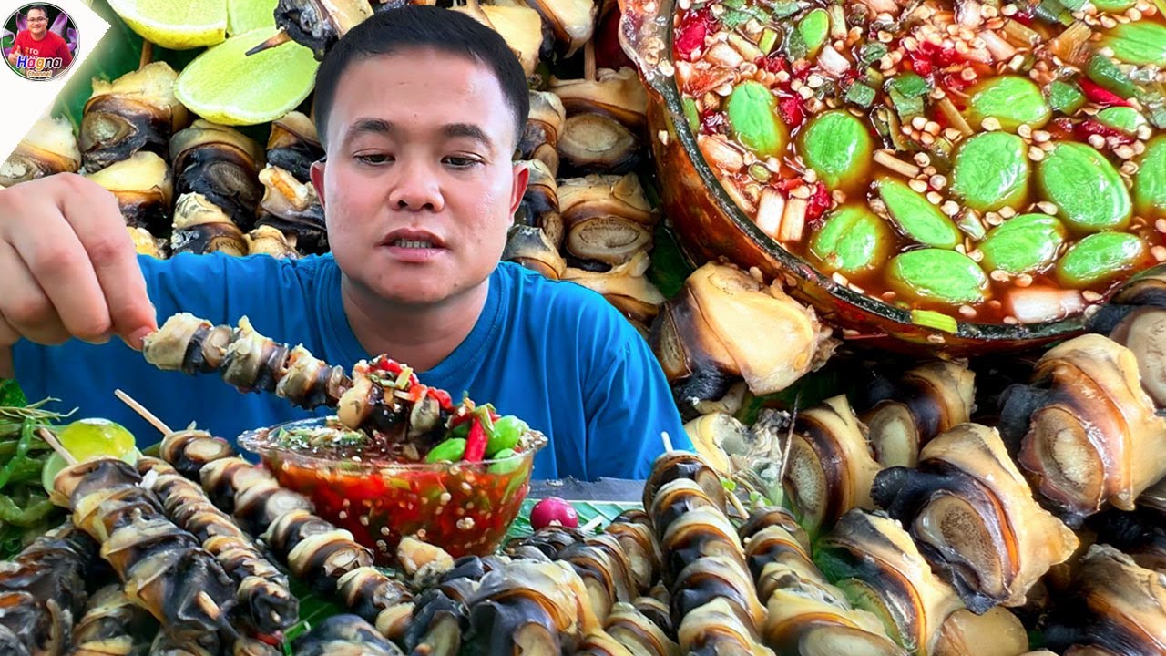 ย่างหอยเชอรี่เสียบไม้หัวใหญ่ๆ น้ำจิ้มโรยเม็ดสะตอกรุบกรุบแซ่บๆ จ้วดๆ คัก