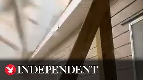 Moment tornado rips roof off North Carolina house while resident shelters inside