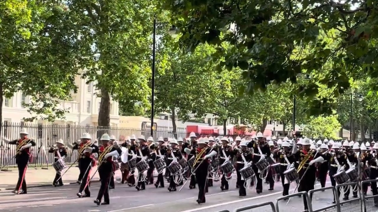 Massed Bands of HM Royal Marines marching to and from Beating Retreat. July 2024.