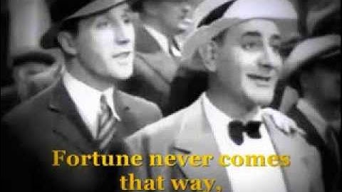 1941: Flanagan & Allen singing "Down Forget-Me-Not Lane"
