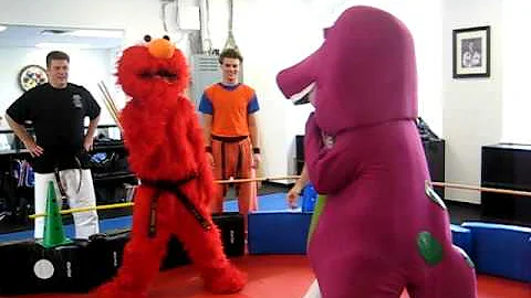 Elmo vs Barney