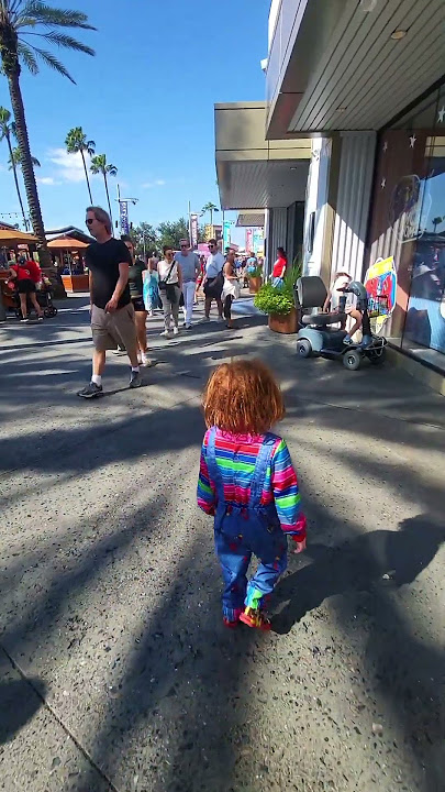 Chucky Tries to Hijack a Mobility Scooter at Universal CityWalk! 🔪😂 #ChuckyOnTheLoose