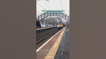 Caledonian Sleeper class 92 passing Slateford