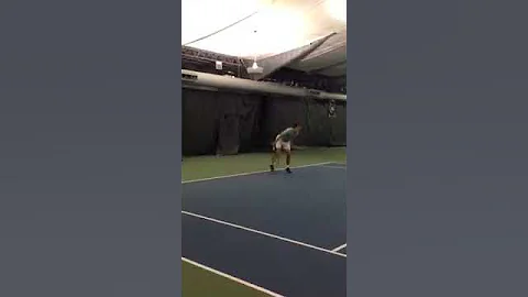 Perry Gregg practicing kick serves with Rennae Stu...