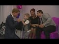 Prince Harry gets hug from young fan