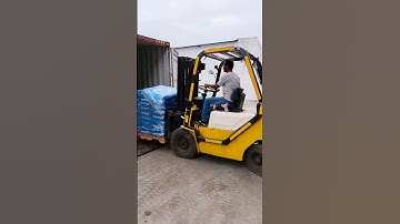 loading palette container forklift